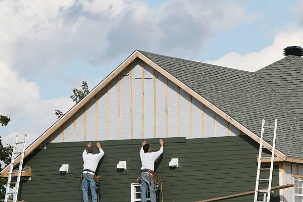 Professional Siding Contractor technician working in White Hall, MD